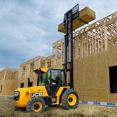 Forklift unloading machinery and industrial equipment in Aldershot